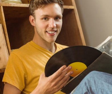 Man admiring vinyl record